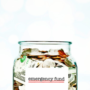 Jar filled with American money for Emergency Fund