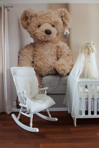 White rocking chair in modern nursery room