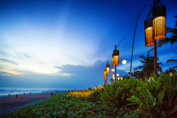 Seminyak Denpasar Bali Indonesia beach at sunset with lanterns