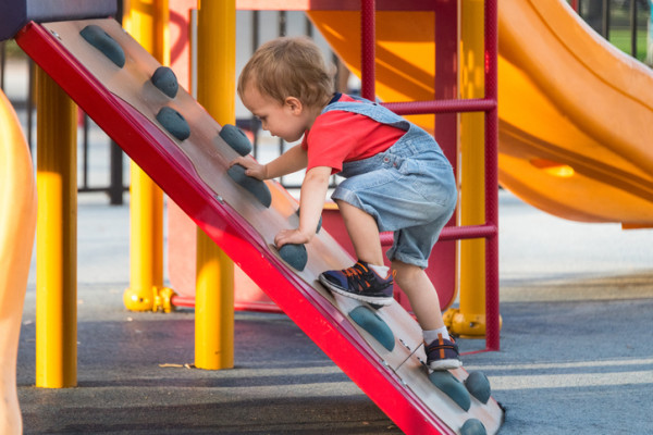 Male Toddler Playing at the playground